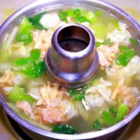 21. Wonton Soup with Crab Meat · Wonton soup with crab meat and vegetables.