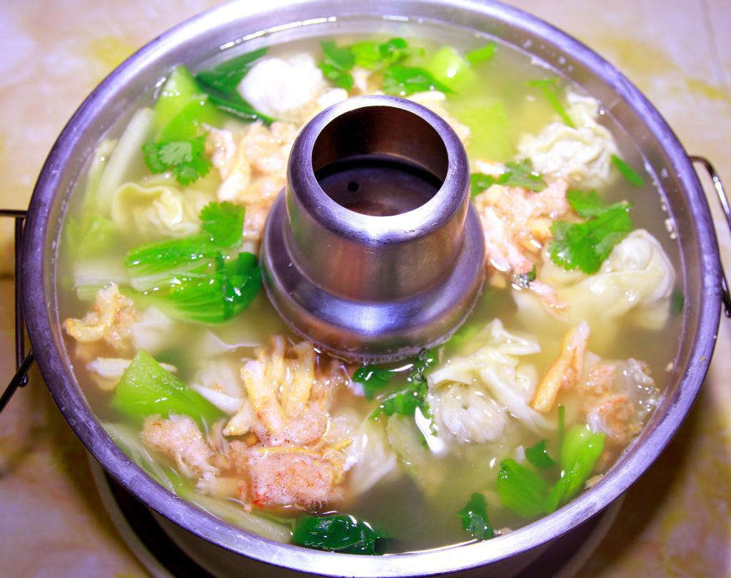 21. Wonton Soup with Crab Meat · Wonton soup with crab meat and vegetables.