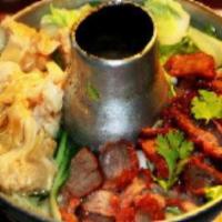 22. Wonton Soup with BBQ Pork · Wonton soup with BBQ pork and vegetables.