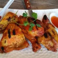 401. Flaming BBQ Chicken · Grilled tender, tasty marinated 1/2 chicken in Thai BBQ sauce served with sweet and sour sau...