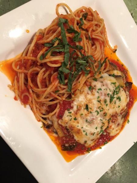 Eggplant Parmesan · Lightly floured Italian eggplant mozzarella and grated Parmesan cheese, topped with marinara then baked. Served with pasta or fresh vegetables. Vegetarian.