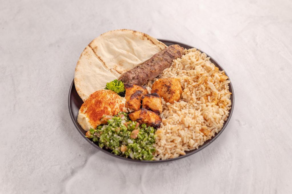4. Combo Kabab Platter · 1 skewer chicken kabab, 1 skewer kafta kabab, served with Lebanese rice, hummus, tabbouleh and pita bread.