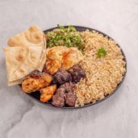 5. Beef and Chicken Kabab Platter · 1 skewer beef kabab, 1 skewer chicken, served with Lebanese rice, hummus, tabbouleh and pita...