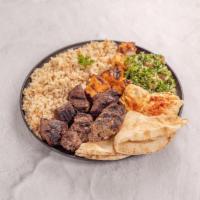 7. Byblos Combo Platter · 1 skewer each, chicken, kafta, beef kabab, served with Lebanese rice, hummus, tabbouleh and ...