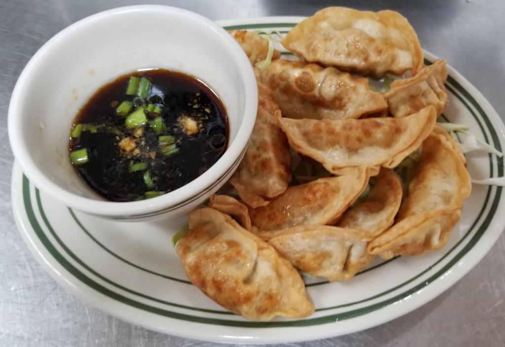 8 Pieces Dumplings · Choice of Fried or steamed.
