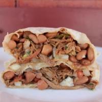 Carnitas Burrito · Shredded pork wrapped in a warm flour tortilla with fresh-made Pico de Gallo, and Yuca's pin...