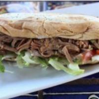 Machaca Torta · Shredded beef served on a grilled French bread with mayo, lettuce and fresh-made Pico de Gal...