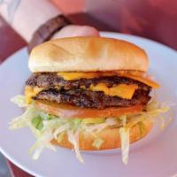Double Cheese Burger · Two 100% beef patties served on a grilled bun with cheese, mayo, lettuce, tomato, ketchup, m...