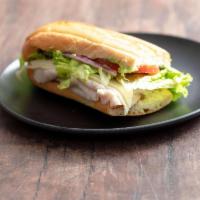 2. Turkey Breast Sandwich · Turkey breast with American cheese. Includes oil & vinegar dressing, leaf lettuce, tomatoes,...