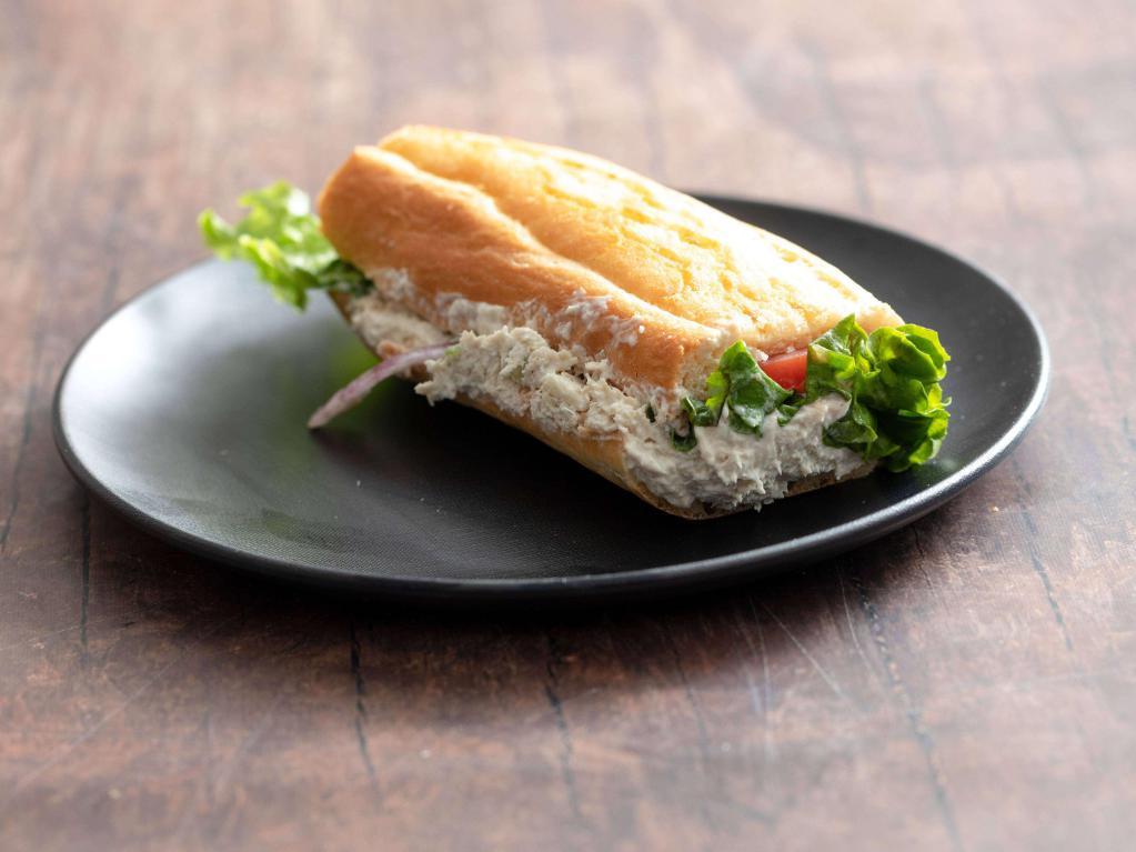 Chicken Salad Sandwich · Includes mayonnaise, leaf lettuce, tomatoes and onions.