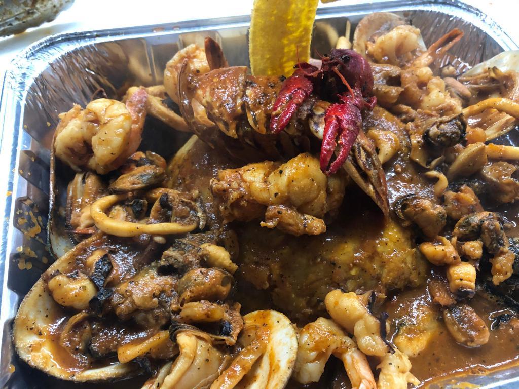 Seafood Mofongo / MariscoFongo  · (serves 1-2 people)mixed seafood mofongo includes lobster tail , octopus , shrimp and clams, calamari and mussels. Mofongo de Mariscos Mixtos incluye cola de langosta , pulpo, camarones, calamares y almejas. ( para 1-2 personas)