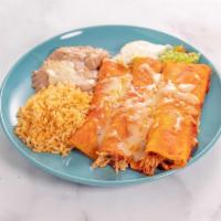 3 Enchiladas · 3 enchiladas with your choice of shredded beef, chicken, or cheese. Served with rice and bea...