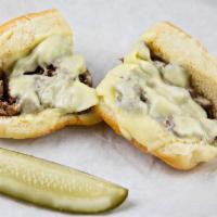 Signature Steak and Cheese Sandwich · 1/2 lb. of our legendary marinated steak tips, pan seared to order then laid on a baguette w...