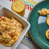 Three Cheese Pimento Cheese · A thick & delicious, Southern Style blend of Pepper Jack & Sharp Cheddar Cheeses. Prepared f...