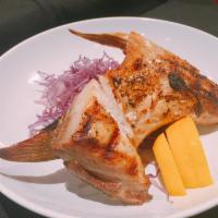 Hamachi Kama Shioyaki · Grilled yellowtail cheek, habanero sea salt, grated-radish and lemon.
