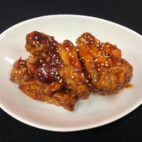 Haru's Wing · 5 pieces fried chicken wing and tossed with house-made spicy sweet chili sauce.