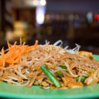 30. Pad Thai · Pan fried rice noodles with choice of meat or vegetarian, bean sprouts, green onions and egg...