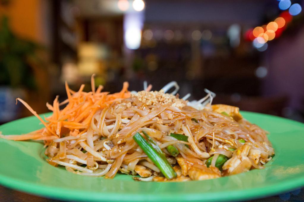 30. Pad Thai · Pan fried rice noodles with choice of meat or vegetarian, bean sprouts, green onions and egg. Topped with ground peanuts.