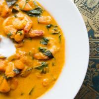 46. Pumpkin Curry · Choice of meat or vegetarian with pumpkin and basil leaves cooked with coconut milk in red c...