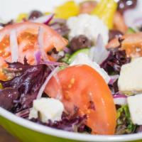 34. Greek Salad · Fresh romaine lettuce, tomatoes, cucumber, red onions, Kalamata olives and feta cheese dress...