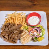 20. Gyros Platter · Beef and lamb gyros, choice of rice or fries, served with tzatziki sauce, Greek salad and pi...