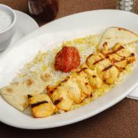 Chicken Kabob Plate · 1 skewer of marinated chicken kabob served with lentil basmati rice and a grilled tomato. In...