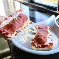 French Bread Pizza · Bread topped with sauce and cheese.