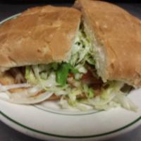 Asada Torta · Charbroiled ranchera/flap steak. Authentic Mexican style grilled sandwich made with beans, m...