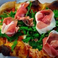 Crudo e Rucola Pizza · 24mo. Parma prosciutto, arugula, tomato sauce, mozzarella, shaved Parmigiano and cherry toma...