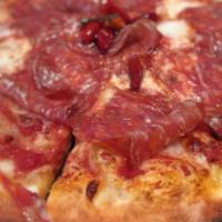 Diavola Pizza · Tomato sauce, mozzarella and spicy calabrese salame. Napoletana flour.