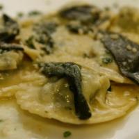 Spinach & Ricotta Cheese Ravioli · with a Delicate Butter and Sage Sauce