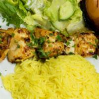Chicken Tikka Kabob · Boneless, skinless legs and thighs cubes served with garlic clip.
