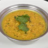 Yellow Dal · Yellow dal, tomato and spices.