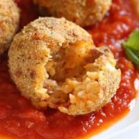 Traditional Rice Balls Parmigiana · Stuffed with a mix of beef and rice, served with marinara sauce
Served with marinara sauce.