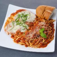 Chicken Parmigiana · Breaded chicken cutlet topped with tomato sauce and mozzarella cheese. Served with side pasta