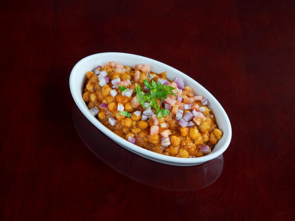 Chana Masala · Chickpeas with onions, garlic, ginger and tomatoes. Gluten-free.