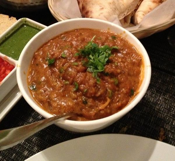 Baigan Bharta · Pureed eggplant cooked with fresh spices. Gluten-free.