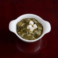 Saag Paneer · Spinach and paneer cheese cooked with ginger and mild spices. Gluten-free.