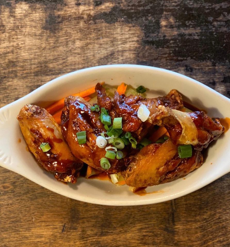 Sweet Chili Wings · Batter fried chicken wings with sweet chili sauce. Spicy.