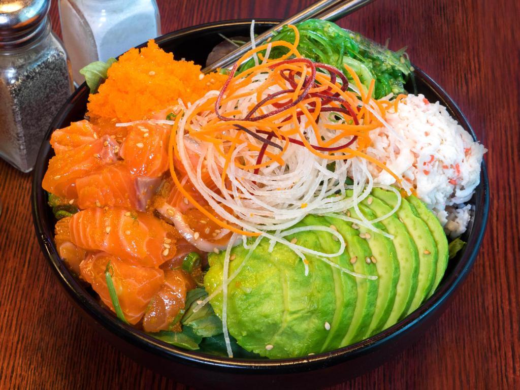 Kobe Salmon Poke Bowl · Salad with raw fish.