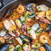 Paella de Mariscos (small) · Bomba rice, monkfish, sepia, squid, shrimp, clams, mussels, saffron, salsa verde. (Takes 35 ...