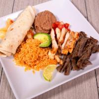Combo Fajitas · Grilled peppers tomatoes and onions. Served with guacamole, sour cream, grated cheese, rice,...
