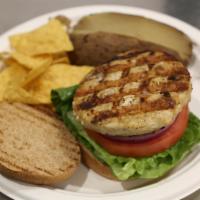 Turkey Burger · Grilled home-style lean turkey burger with lettuce, tomatoes and onions. Served on a multi-g...