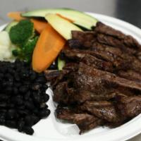 Protein Boost Grilled Steak Entree Platter · 8 oz. flame grilled steak with a side of black beans and steamed vegetables.