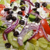 28. Greek Salad · Served with lettuce, tomatoes, onion, cucumber, goat cheese, red onion and Greek Kalamata ol...