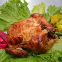 1. Whole Chicken · Rotisserie chicken served with garlic sauce, turnips and pita bread.