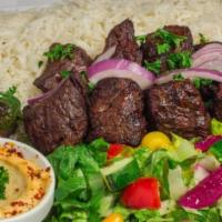 10. Beef Shish Kabob Plate · Marinated beef served with hummus, rice, salad, onion and pita bread.