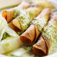 Rolled Taquitos · Choice of protein. Crispy rolled taquitos with our 51/50 vegetarian beans, tomatillo sauce a...
