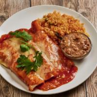 Enchiladas de Pollo · Chicken. Served with rice and beans.