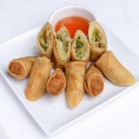 1. Vegetable Egg Roll · 5 pieces. Fried vegetable egg rolls served with sweet and sour sauce.